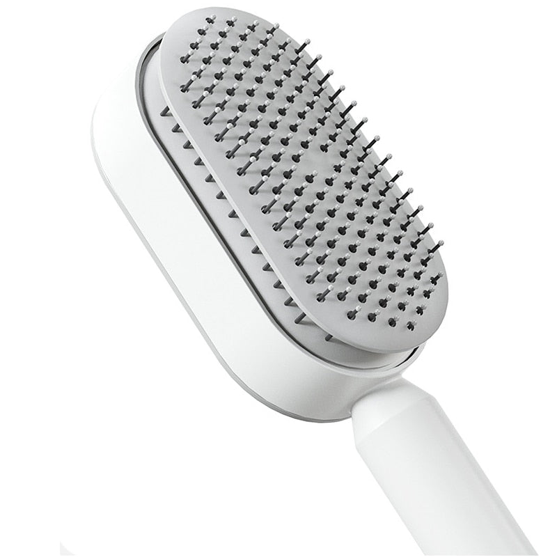 Brosse à cheveux autonettoyante antistatique