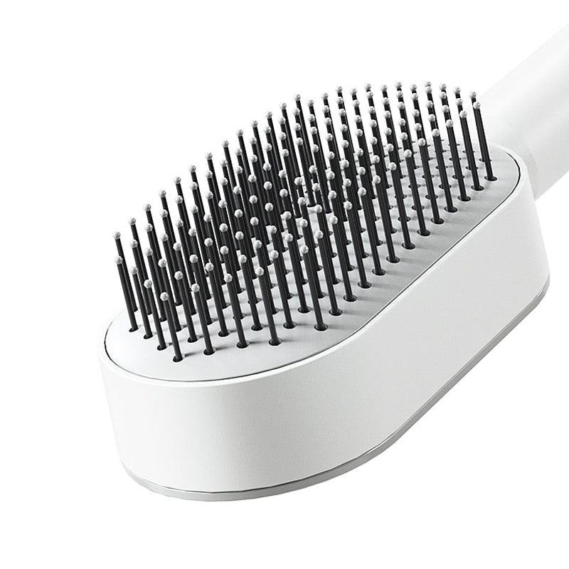 Brosse à cheveux autonettoyante antistatique